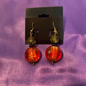 Stunning Bohemian Style pierced earrings featuring beautiful orange glass beads